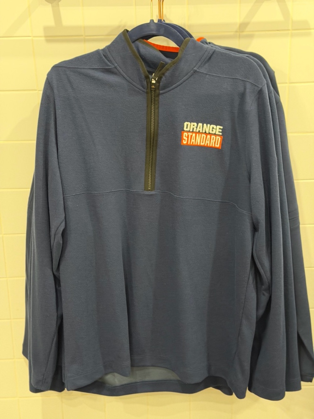 Nike Navy Blue Half-Zip Sweatshirt with Orange Accent